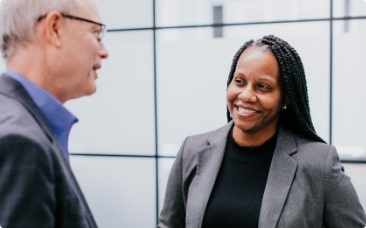 Man and woman talking in an office